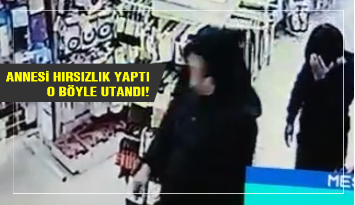 Annesi hırsızlık yaparken utancından yüzünü gizledi