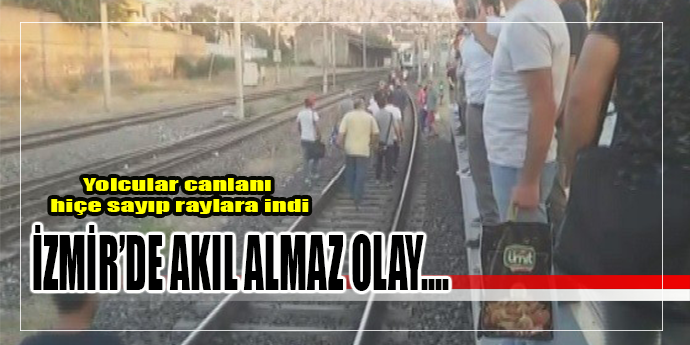 Tren gecikince raylara inen yolcular diğer durağa yürüdü