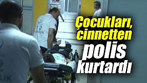 Çocukları, cinnetten polis kurtardı
