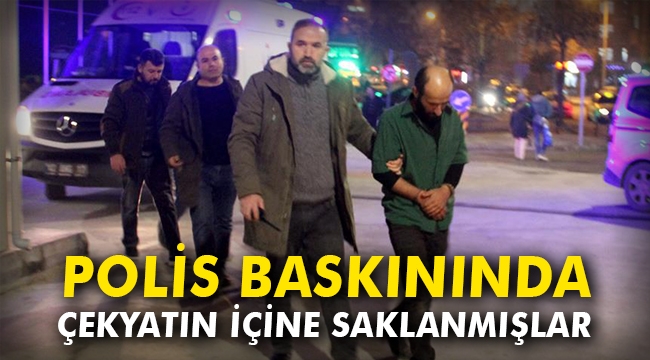 Polis baskınında çekyatın içine saklanmışlar