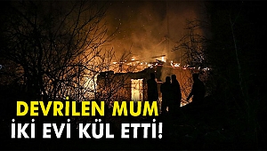 Devrilen mum iki evi kül etti