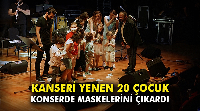 Kanseri yenen 20 çocuk konserde maskelerini çıkardı