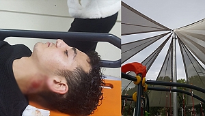 Parkta üzerine gölgelik düşen genç yaralandı