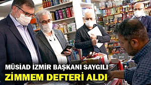 MÜSİAD İzmir Şube Başkanı Bilal Saygılı 'zimem defteri' satın aldı