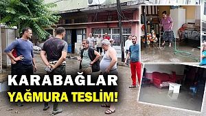 Karabağlar'da işyerlerini su bastı... Araçlar zarar gördü...