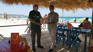 Çeşme'de Mavi Bayrak ve Turuncu Çember bir arada