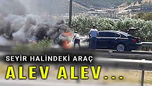 İzmir'de hareket halindeki otomobil yandı sürücü zor kurtuldu