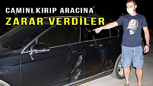 Belediye Başkanı ve koruması trafikte tartıştığı kişinin aracına zarar verdiler