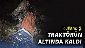 İzmir'de devrilen traktörün altında kalan sürücü yaralandı