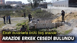 Etrafı duvarlarla örülü boş arazide erkek cesedi bulundu