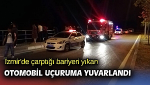 İzmir'de çarptığı bariyeri yıkan otomobil uçuruma yuvarlandı