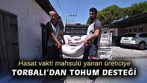 Hasat vakti mahsulü yanan üreticiye Torbalı Belediyesi’nden tohum desteği