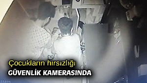Çocukların hırsızlığı güvenlik kamerasında