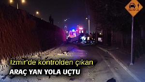 İzmir'de kontrolden çıkan araç yan yola uçtu