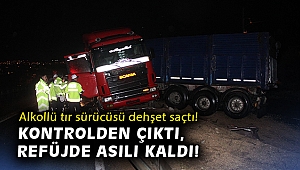 Alkollü tır sürücüsü dehşet saçtı! Kontrolden çıktı, refüjde asılı kaldı!