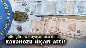Polisi görünce uyuşturucu dolu kavanozu dışarı attı