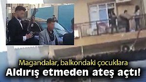 Magandalar, balkondaki çocuklara aldırış etmeden ateş açtı