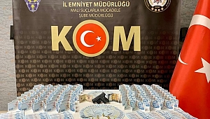 Sahte parayla telefon almak isterken suçüstü yakalandılar