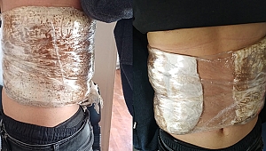 Vücuduna sardığı esrarla otobüste yakalandı