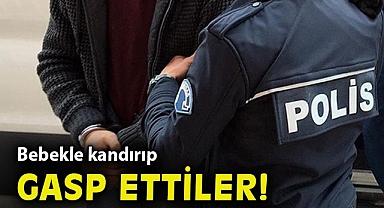 Bebeğini bahane ederek yardım istediği sürücüyü gasp etti