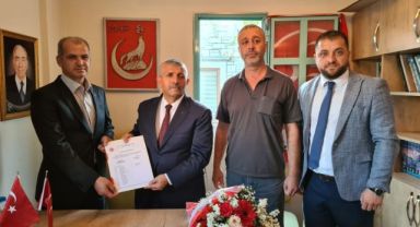 MHP Foça İlçe Başkanlığında bayrak değişimi