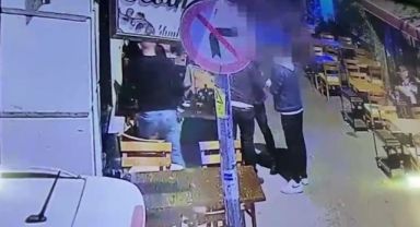 Gazetecinin telefonunu ceketiyle gizleyerek çaldı