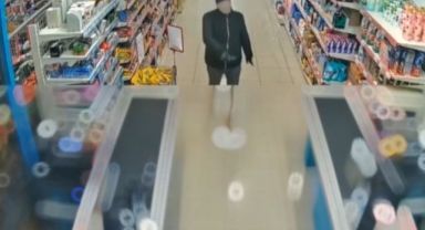 Yüzüne kadın çorabı geçirdi, marketin kasasını böyle boşalttı