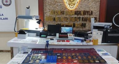 Sahte pasaport üreten şebekeye baskın: 3 gözaltı