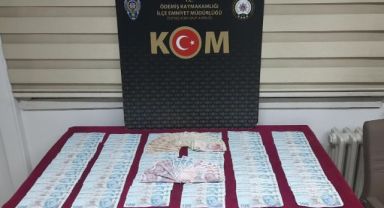 İzmir'de üzerinden 42 bin lira sahte para çıkan kişi tutuklandı