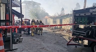 Mutfak tüplerinin de bulunduğu market deposunda korkutan yangın