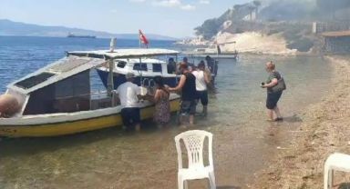 Orman yangınında vatandaşlar denizden tahliye ediliyor
