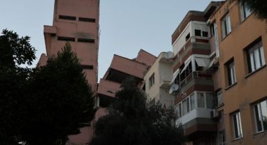 İzmir'de yıkımı yapılan lise yan yattı, 3 apartman boşaltıldı