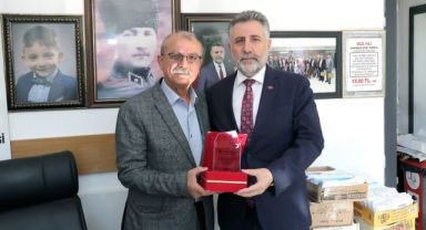 Başkan Sandal’dan 24 muhtara teşekkür plaketi