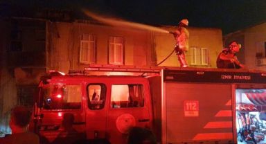 Tekstil atölyesinde çıkan yangın, bitişikteki binaya da sıçradı