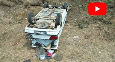 Taklalar atıp şarampole giren araçtan burnu dahi kanamadan çıktı