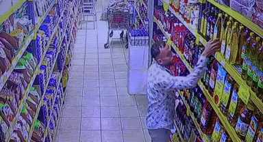 Ayçiçek yağını pantolonunun içine sokarak çaldı