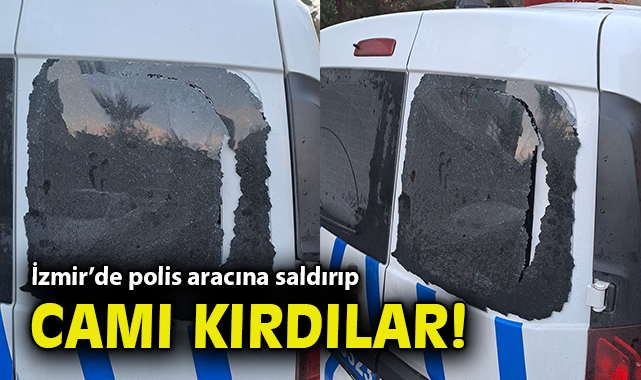 İzmir’de polis aracına saldırıp camı kırdılar