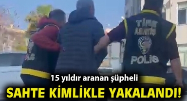 İzmir'de 15 yıldır aranan şüpheli sahte kimlikle yakalandı