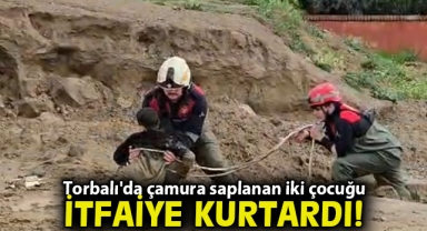 Torbalı'da çamura saplanan iki çocuğu itfaiye kurtardı