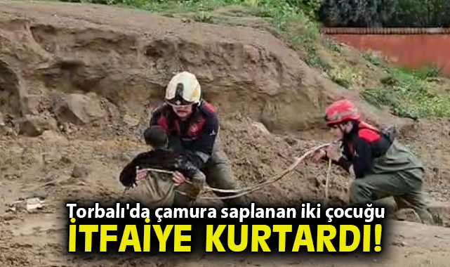 Torbalı'da çamura saplanan iki çocuğu itfaiye kurtardı