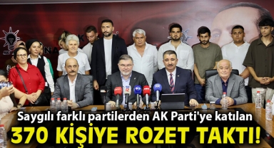 AK Partili Saygılı, farklı partilerden AK Parti'ye katılan 370 kişiye rozet taktı