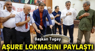Başkan Tugay aşure lokmasını paylaştı